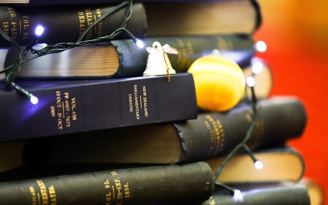 The Hansard team show off their festive decorating skills.