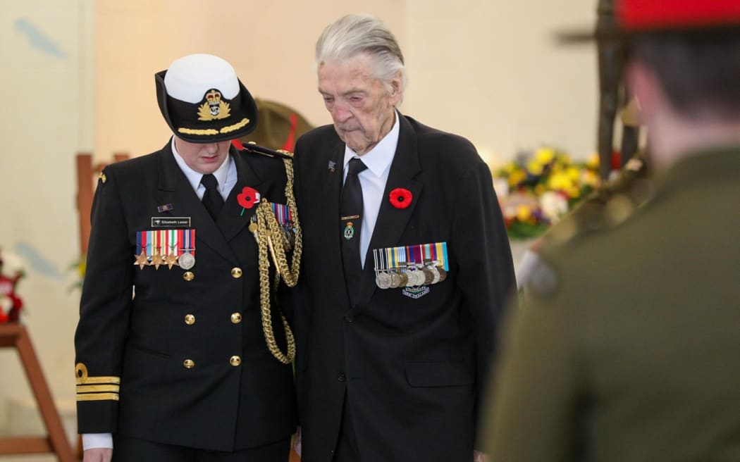 A private Anzac ceremony is held at the Hall of Memories at Pukeahu after a larger public ceremony was cancelled due to high winds.