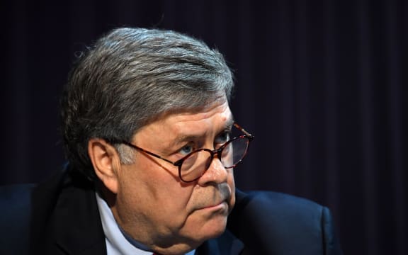 US Attorney General William Barr looks on during a roundtable with US President Donald Trump,faith leaders and small business owners at Gateway Church Dallas Campus in Dallas, Texas, on June 11, 2020.