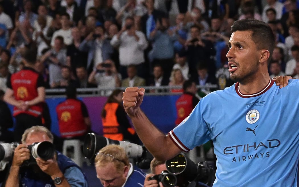 Manchester City's Spanish midfielder #16 Rodri celebrates scoring his team's first goal during the UEFA Champions League final football match between Inter Milan and Manchester City at the Ataturk Olympic Stadium in Istanbul, on June 10, 2023. (Photo by FRANCK FIFE / AFP)