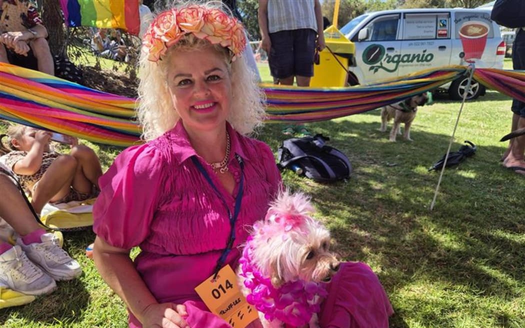 Theresa and pup Truffles in pink.