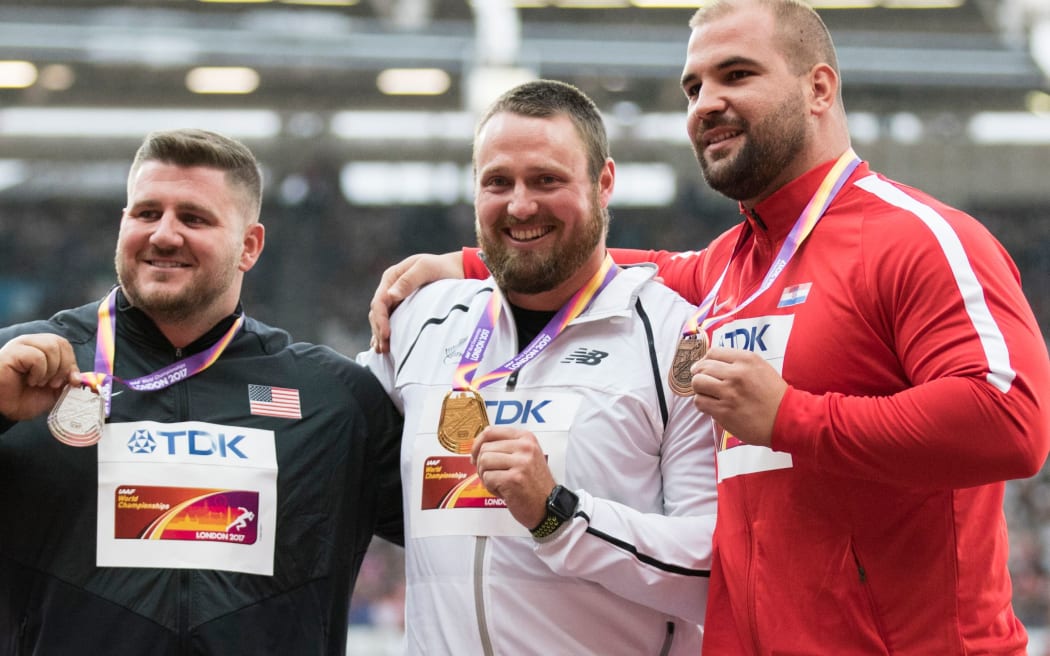 Tom Walsh and fellow medallists Joe Kovacs (left) and Croatian Stipe Zunic