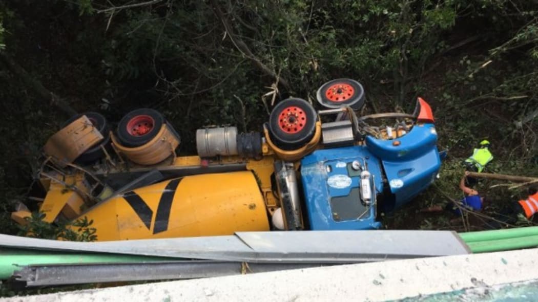 The truck crashed 10m down a bank.