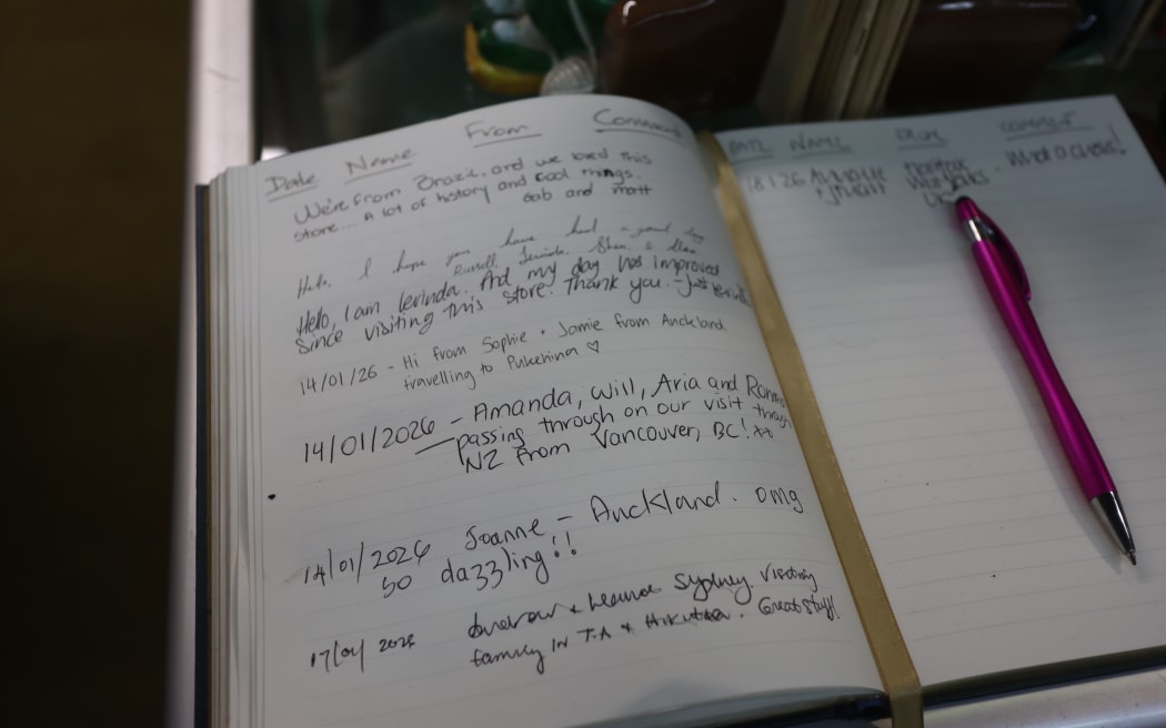 Picture of a book with some customer comments.