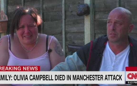 CNN interviewing the parents of a girls killed in the Manchester bombing.