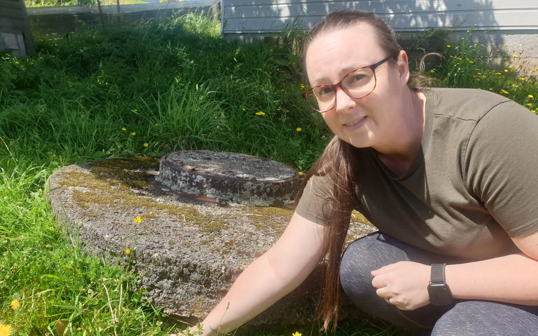 Jaime Philips says the geotechnical report found the council stormwater drain contributed to the slip.
