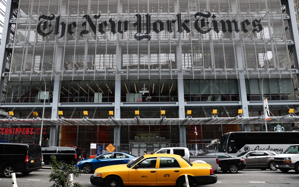 The New York Times logo is seen on the building in New York City, United States on October 27, 2022. (Photo by Jakub Porzycki/NurPhoto) (Photo by Jakub Porzycki / NurPhoto / NurPhoto via AFP)