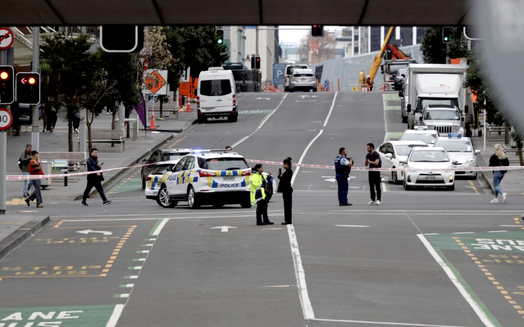 Police at the scene of a cordon on Lower Albert Street in Auckland'S CBD following a fatal shooting incident on 20 July, 2023.