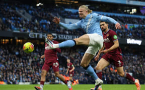 Manchester City's Norwegian striker #09 Erling Haaland shoots but misses a chance during the English Premier League football match between Manchester City and West Ham United at the Etihad Stadium in Manchester, north west England, on December 20, 2025. (Photo by Darren Staples / AFP) / RESTRICTED TO EDITORIAL USE. NO USE WITH UNAUTHORIZED AUDIO, VIDEO, DATA, FIXTURE LISTS, CLUB/LEAGUE LOGOS OR 'LIVE' SERVICES. ONLINE IN-MATCH USE LIMITED TO 120 IMAGES. AN ADDITIONAL 40 IMAGES MAY BE USED IN EXTRA TIME. NO VIDEO EMULATION. SOCIAL MEDIA IN-MATCH USE LIMITED TO 120 IMAGES. AN ADDITIONAL 40 IMAGES MAY BE USED IN EXTRA TIME. NO USE IN BETTING PUBLICATIONS, GAMES OR SINGLE CLUB/LEAGUE/PLAYER PUBLICATIONS. /
