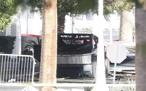A Tesla Cybertruck is shown after it caught fire and exploded outside the lobby of President-elect Donald Trump's hotel, on January 1, 2025, in Las Vegas. - At least one person was killed and seven wounded when a Tesla Cybertruck exploded outside a hotel belonging to US President-elect Donald Trump in Las Vegas, police said Wednesday. (Photo by WADE VANDERVORT / AFP)