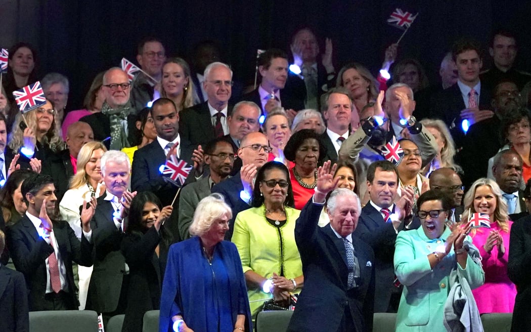 Britain's Queen Camilla (C) and Britain's King Charles III (3R), acknowledges the applause during the Coronation Concert at Windsor Castle in Windsor, west of London on May 7, 2023.