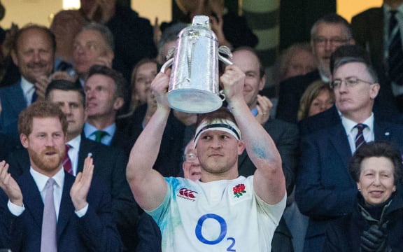 Dylan Hartley lifts the Calcutta Cup after England defeated Scotland.