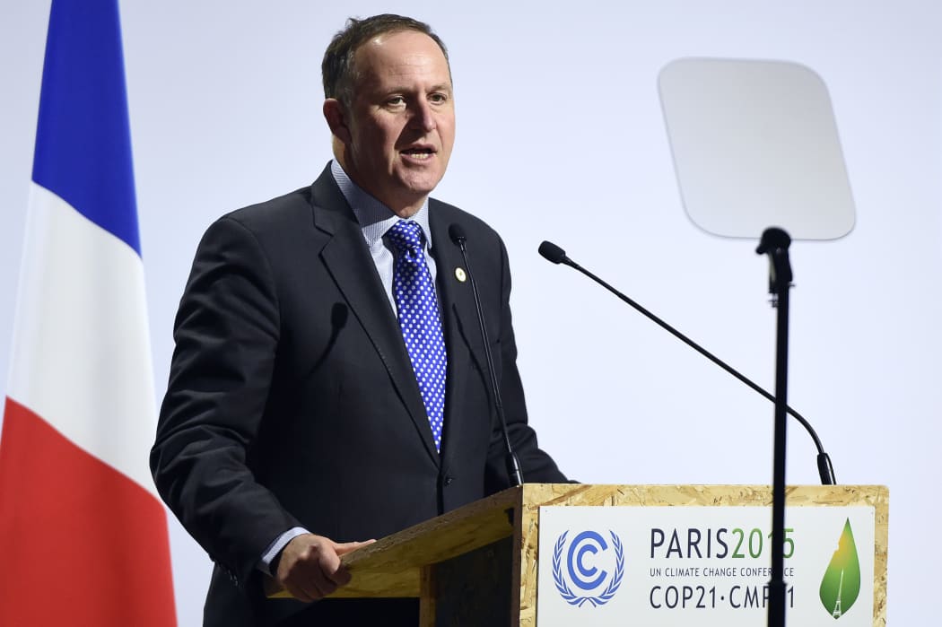 New Zealand's Prime Minister John Key delivers a speech during the opening day of the World Climate Change Conference 2015 (COP21), on November 30, 2015 at Le Bourget, on the outskirts of the French capital Paris.