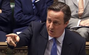 A video grab from footage broadcast by the UK Parliament’s Parliamentary Recording Unit (PRU) shows British Prime Minister David Cameron speaking House of Commons in central London on December 2, 2015 during the debate on a motion to join air strikes on Islamic State (IS) group targets in Syria.