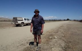 Farmer Andrew Paterson on his bone dry  farm near Omakau, Central Otago.