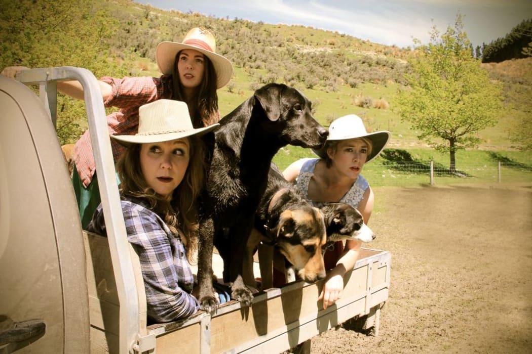 Emma Newborn, Amelia Dunbar, Mel Parsons, with dogs