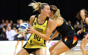 Central Pulse captain Katrina Grant with  possession of the ball
