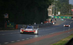The Cadillac Hertz of Earl Bamber, Sebastien Bourdais and Jenson Button, in action during qualifying for the 24 Hours of Le Mans in France. June 11, 2025. (Photo by Alessio Morgese  Gabriele Lanzo/NurPhoto) (Photo by Alessio Morgese / NurPhoto via AFP)