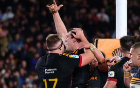 Brodie Retallick of the Chiefs celebrates his match-securing try in the Super Rugby Pacific semi-final match against the Brumbies at FMG Stadium in Hamilton.