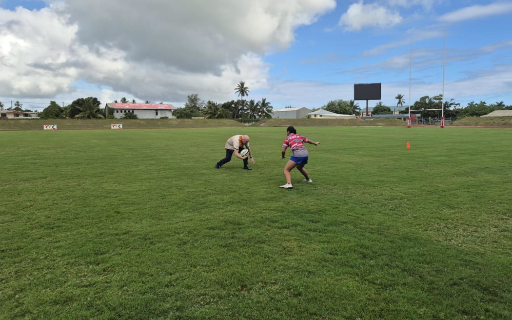 Prime Minister Christopher Luxon steps out a young rugby player's defence.