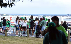 Top of the morning . . .
St Patrick’s day revelers take in the city vista from Brackens View. PHOTO: PETER MCINTOSH