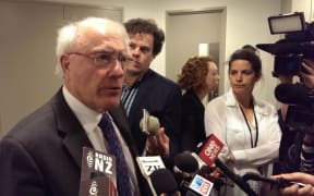 Sir Geoffrey Palmer speaks to the media after appearing before a parliamentary committee.