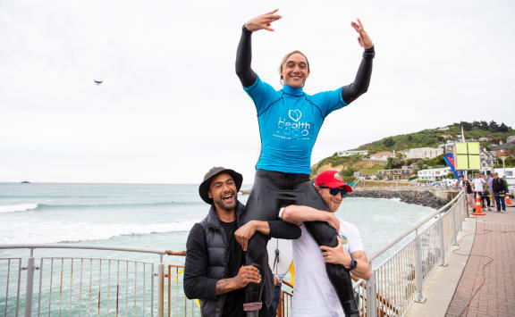 Elliot Paerata-Reid celebrates his win in the Open Men's final at the 2020 NZ Surfing Championships at St Clair, Dunedin.