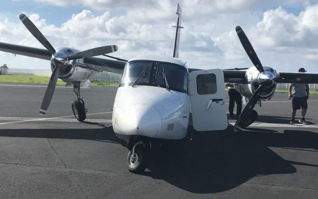 The damaged Twin Commando aircraft.