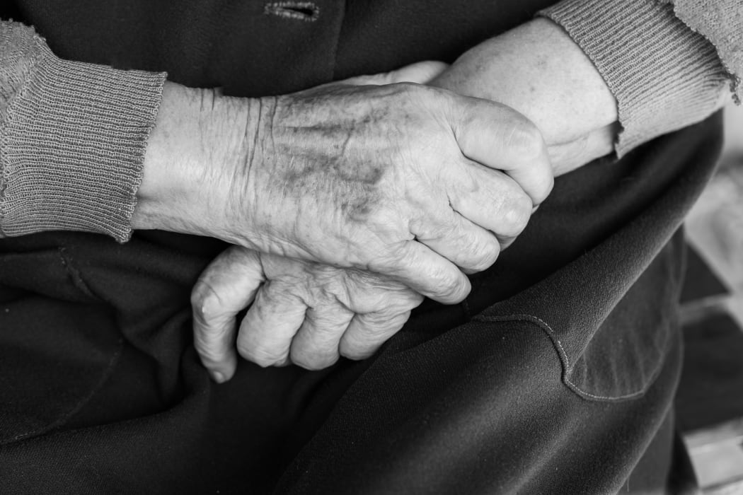 Elderly woman.