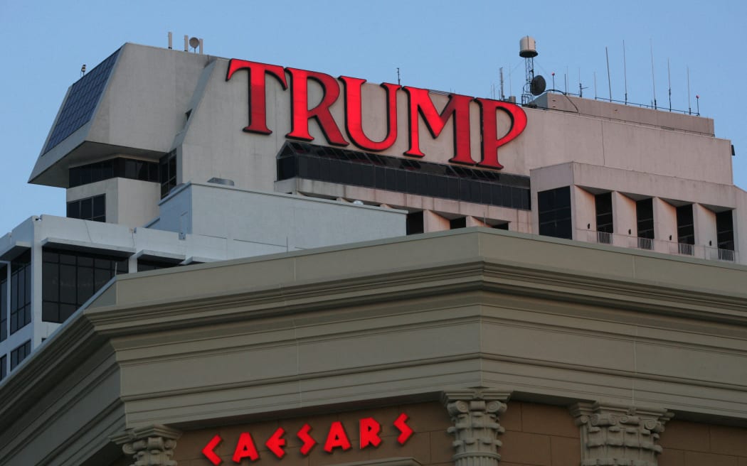 The Trump Plaza hotel and casino and Caesars Atlantic City are pictured in Atlantic City, New Jersey, 25 May 2007. Gambling has been legal in Atlantic City, one of the few such cities in the United States, since the first casino opened in 1978. (Photo by SAUL LOEB / AFP)