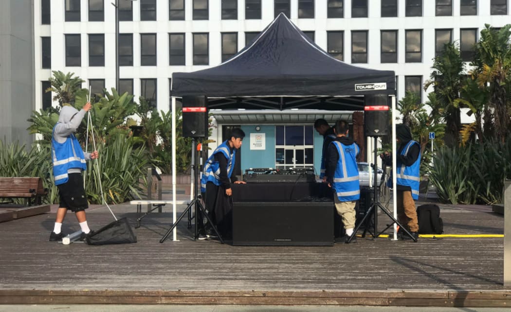 A group of south Auckland youth setting up for an event that Toko Manuel's Rep FM is delivering for Eke Panuku in Manukau.