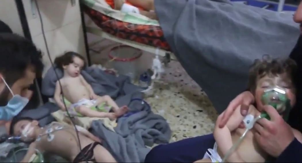Affected Syrian children receive medical treatment following the apparent chemical attack in Douma.