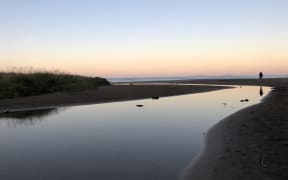 A view of the Poor Knights Islands from Sandy Bay, Northland.