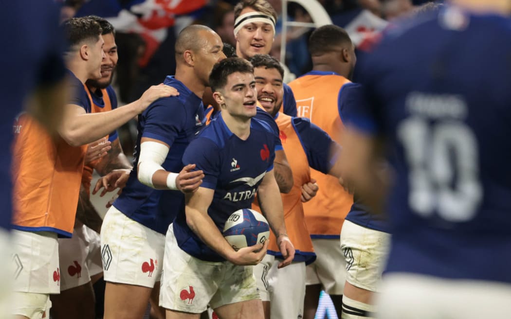Nolan Le Garrec celebrates his try during the Guinness Six Nations 2024 match between France and England.