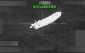 This screengrab taken from a video posted by Defence Secretary Pete Hegseth, shows a boat shortly before it is struck by a missile on 9 November.
Mandatory Credit:	Secretary of Defence Pete Hegseth via CNN Newsource