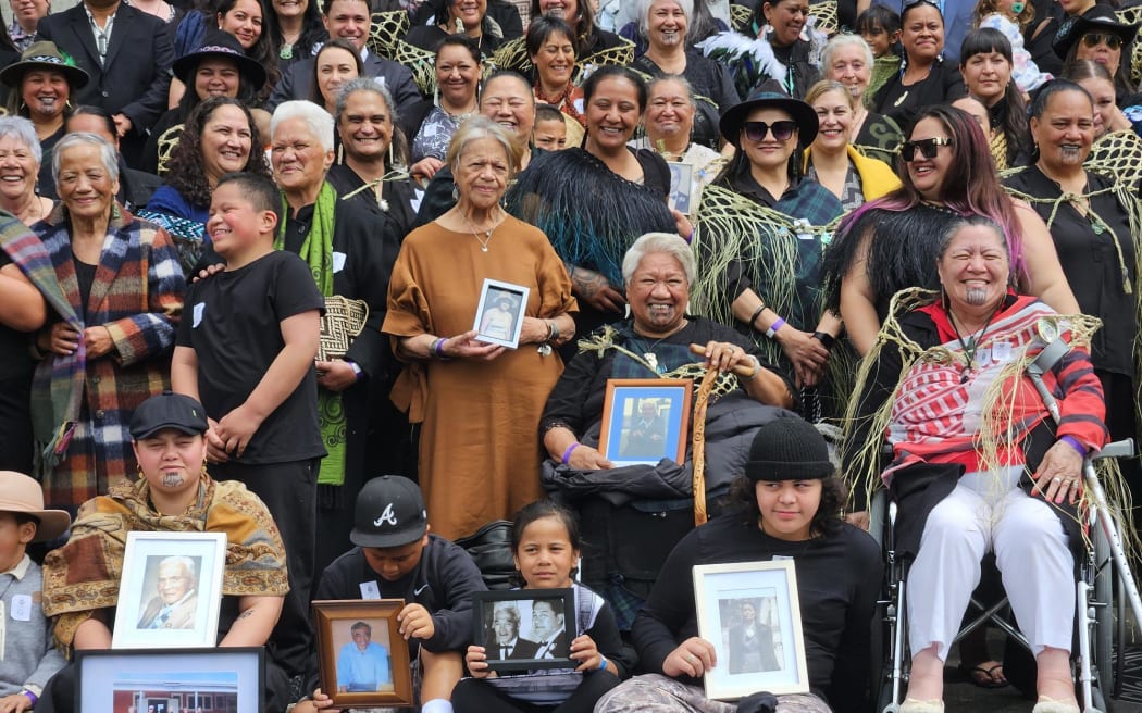 Many are carrying photographs of relatives who have passed away over the long years of negotiation between the iwi and the Crown.