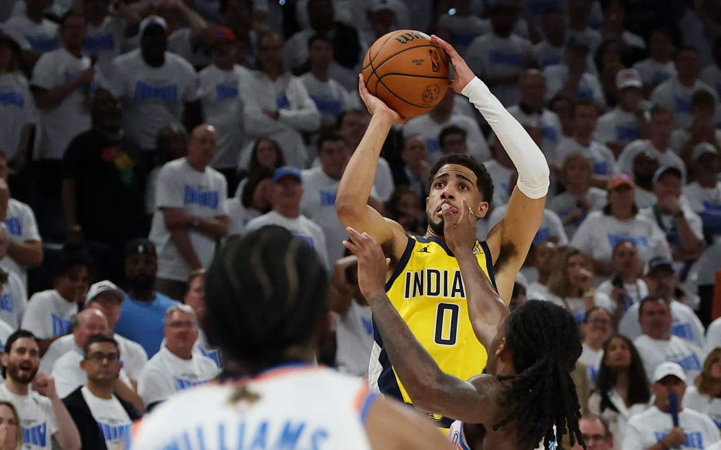 Tyrese Haliburton of the Indiana Pacers scores a basket with .3 seconds remaining to give his side victory in game one of the NBA finals against the Oklahoma City Thunder in Oklahoma.
