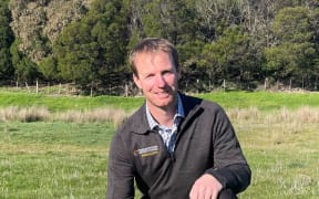 Marlborough District Council biosecurity manager Liam Falconer with an example of Chilean needle grass at the Wither Hills Farm Park near Blenheim.