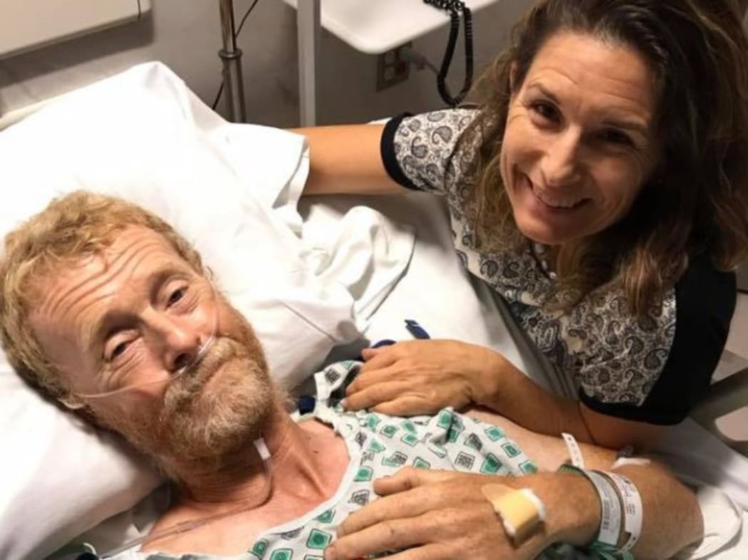 Nick Ashill pictured with his wife in hospital after being struck by a ute and left for dead on a US highway.
