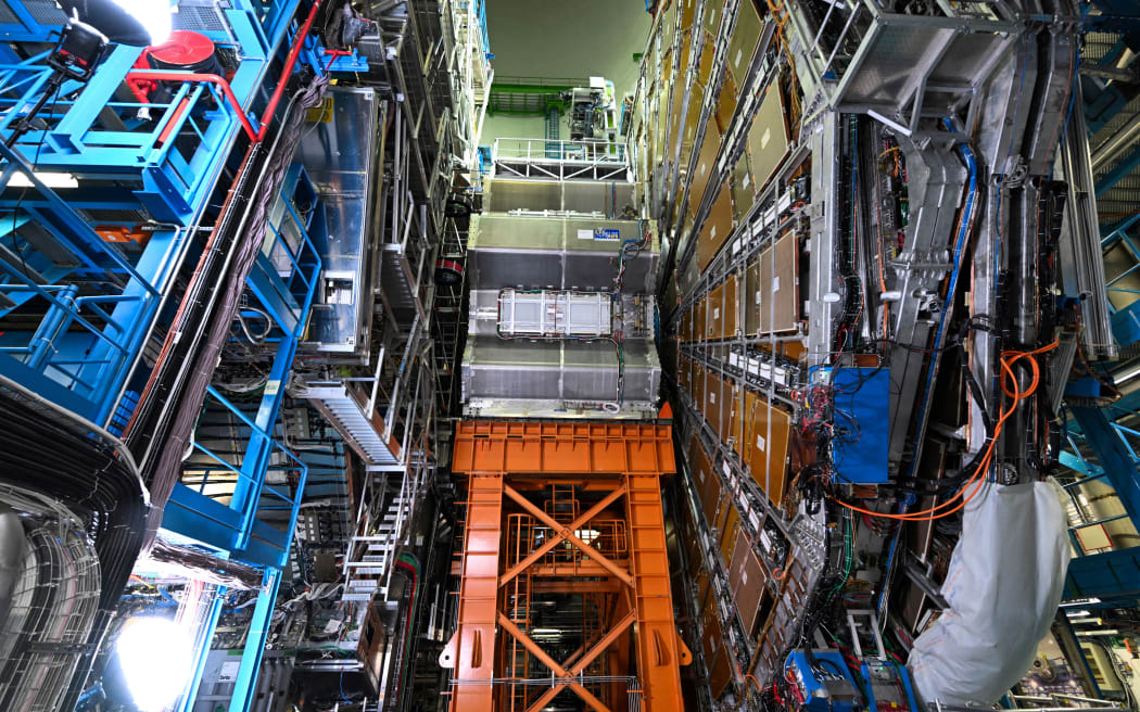 This photograph shows the ATLAS experiment at the CERN (European Organisation for Nuclear Research) in Meyrin near Geneva, on November 16, 2023, during a visit of the Frenc President. (Photo by Bertrand GUAY / POOL / AFP)