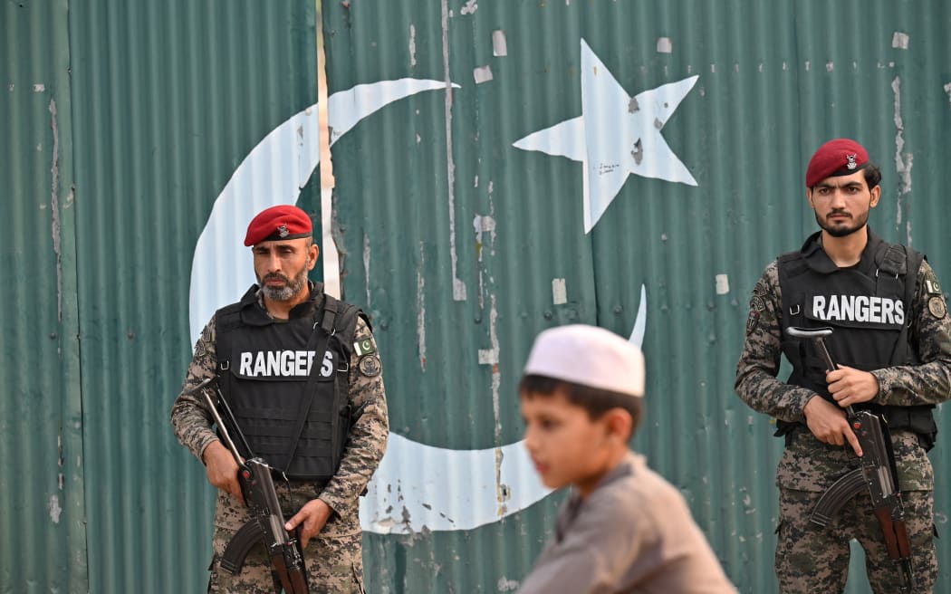 Paramilitary soldiers stand guard outside the Government Health and Educational complex after Indian strikes in Muridke, about 30 kilometres from Lahore.