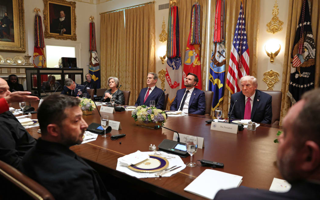 US President Donald Trump meets with Ukrainian President Volodymyr Zelensky (L) in the Cabinet Room of the White House in Washington, DC, on October 17, 2025. (Photo by TOM BRENNER / AFP)