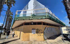 Boarded-up stores in central Gisborne.