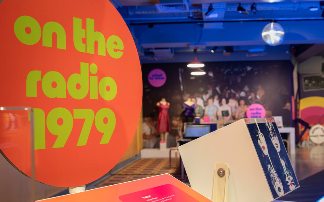 The exhibition includes its own disco-style dancefloor and music stations playing hit songs from the period.