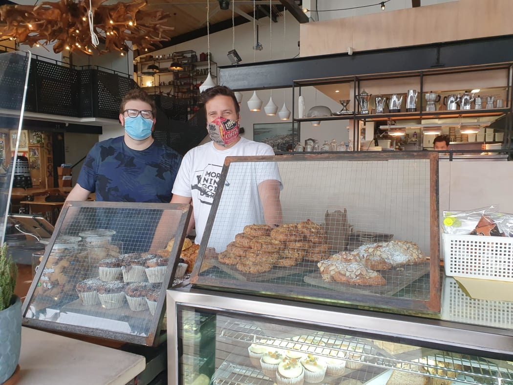 Crave Cafe's James and Nigel Cottle. Nigel Cottle said he was expecting to sell 200 cheese scones today with Auckland in its first day of level 3