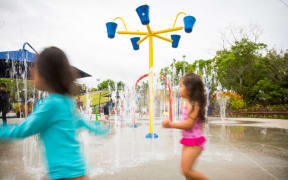 Children playing at the splash pad at Māngere’s Moana-Nui-ā-Kiwa Pools and Leisure centre.