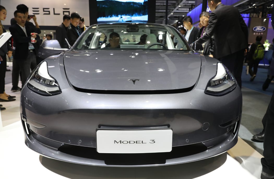 Tesla's Model 3 is displayed during China International Import Expo.