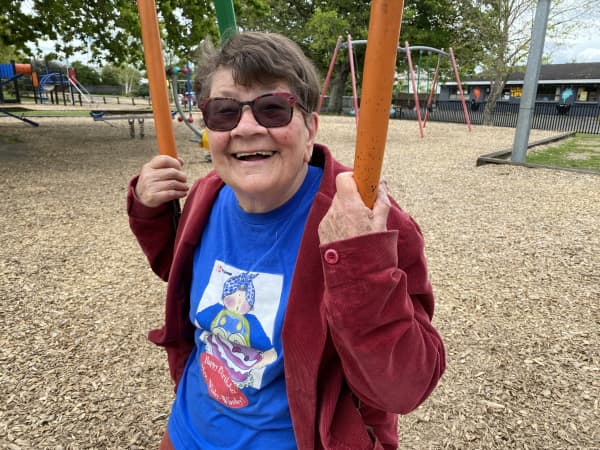 Joy Cowley enjoying the swings at the Featherston playground which will soon bear her name. PHOTOS/SUE TEODORO