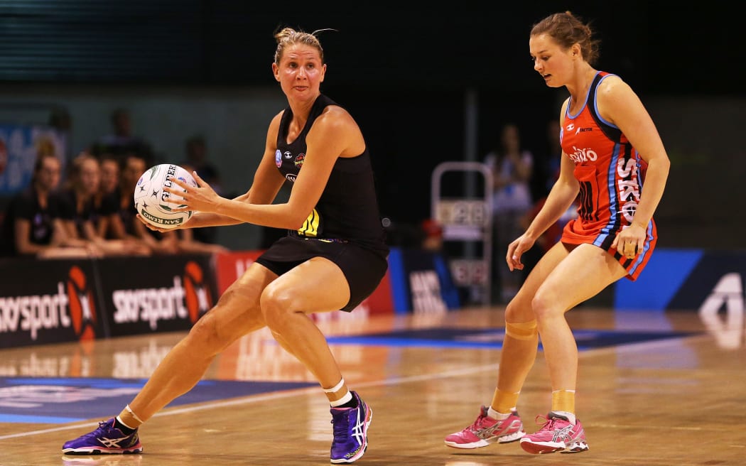 ANZ netball action 2014 Casey Kopua of the Magic and Nicola Mackle of the Tactix.