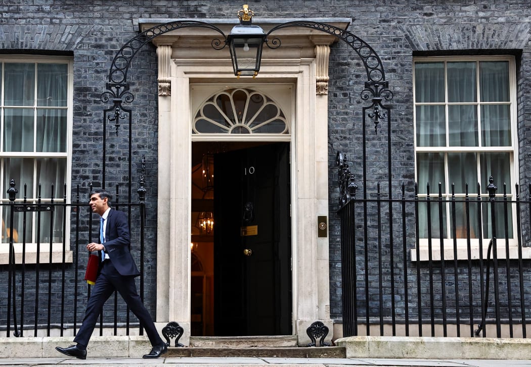 Britain's Prime Minister Rishi Sunak leaves from 10 Downing Street in central London, on January 24, 2024 to take part in the weekly session of Prime Minister's Questions (PMQs) in the House of Commons. (Photo by HENRY NICHOLLS / AFP)